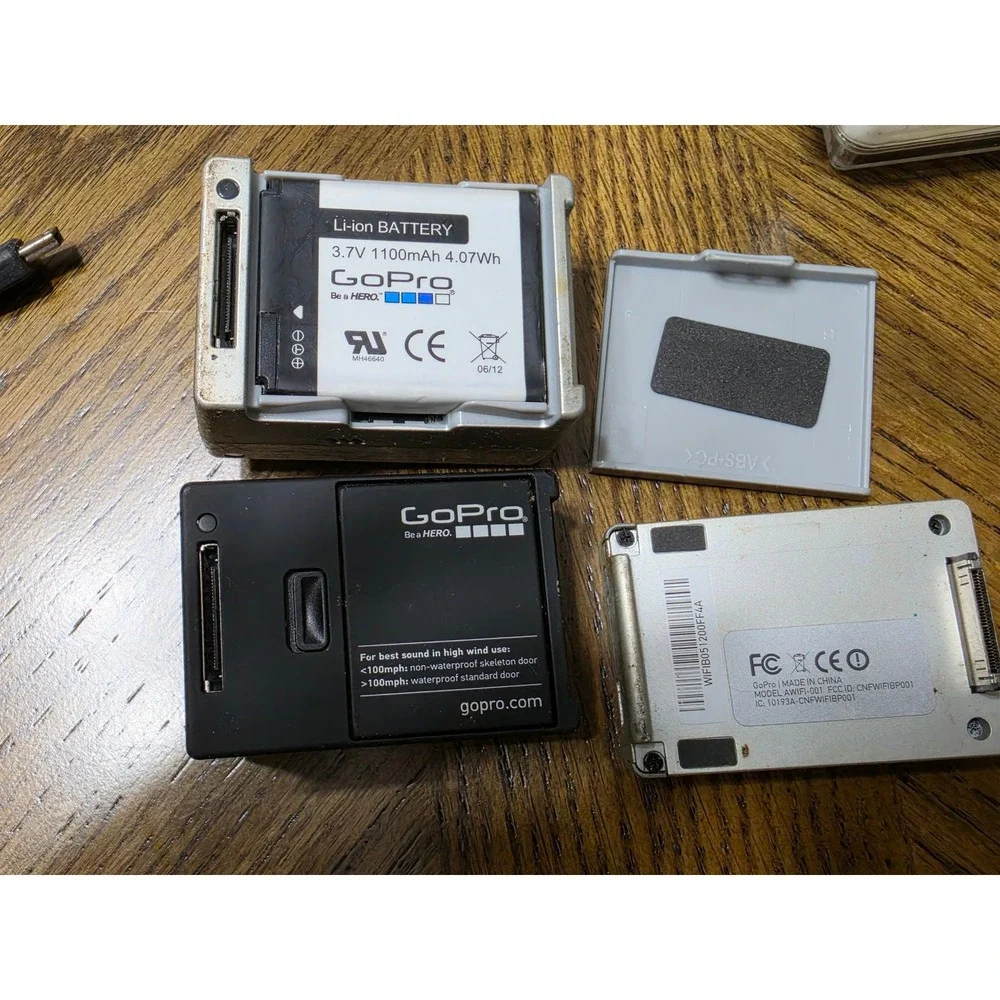 GoPro HERO2 and HERO3 Camera w Cases and Batteries for refurb parts UNTESTED